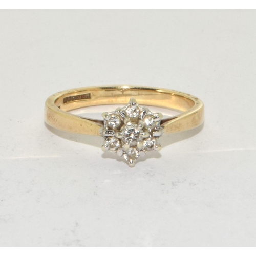 279 - A 9ct gold Diamond daisy ring size N