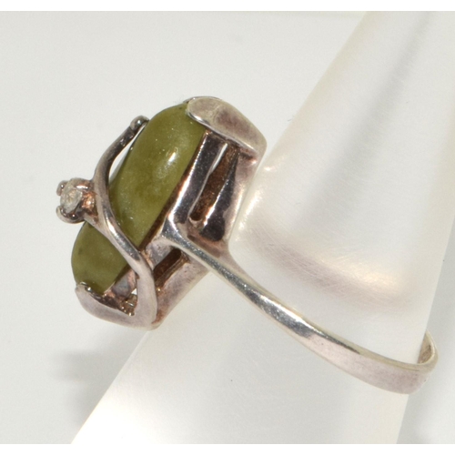 394 - A silver and jadeite ring, Size L 1/2.