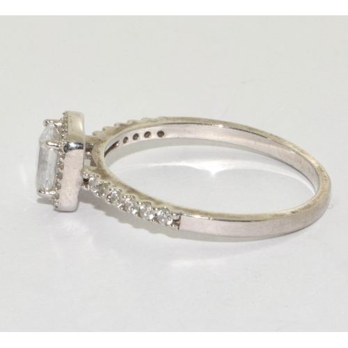 366 - A 925 silver halo style ring Size T