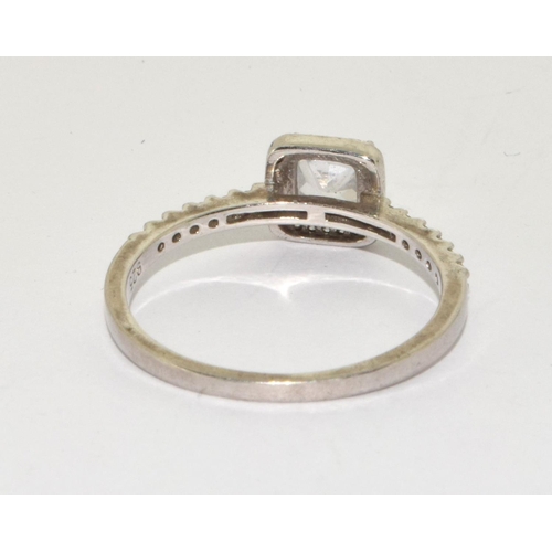 366 - A 925 silver halo style ring Size T