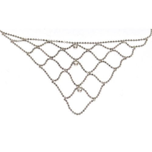 294 - A diamond and 9ct white gold spider web necklace.