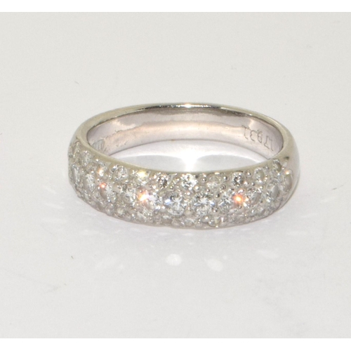 276 - A platinum and diamond set band ring Size M, 4.5g