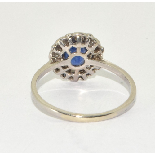 326 - An 18ct white gold Sapphire/Diamond daisy ring Possibly French, Size S. Boxed.