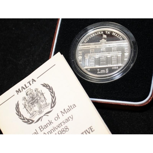 106 - Central Bank of Malta 1oz Silver Proof coin, cased with certificate c/w a 1oz Silver Britannia coin