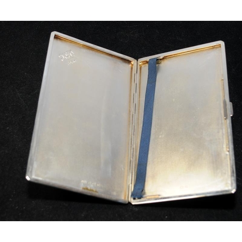 353 - Large Sterling Silver cigarette case. Hallmarked 
 by Adie Bros for Birmingham 1936. 237g