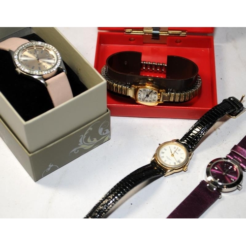 302 - A small collection of ladies and gents fashion watches