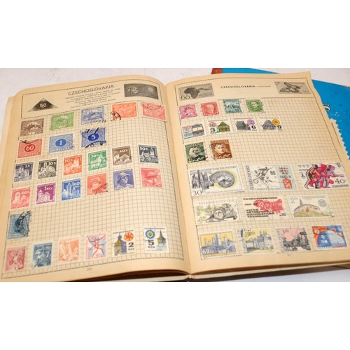 192 - 5 x schoolboy stamp albums with a good selection of world stamps