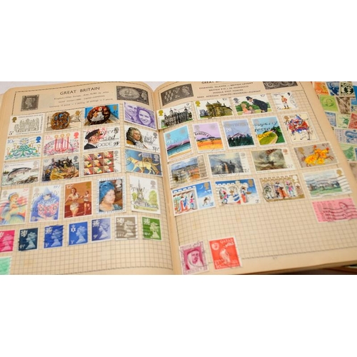 192 - 5 x schoolboy stamp albums with a good selection of world stamps