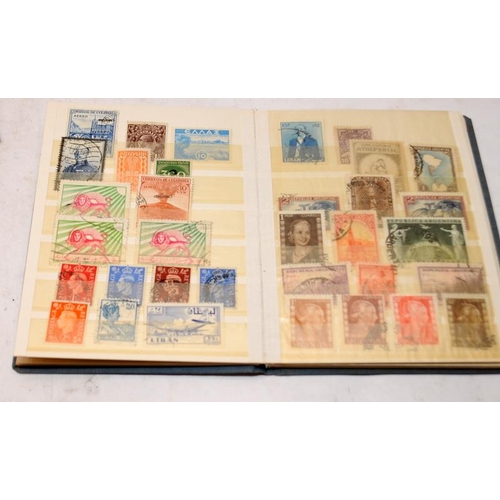 193 - 3 x small stock books with a selection of world stamps