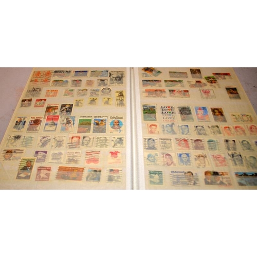 198 - 3 stock books containing a good number of USA postage stamps including early examples