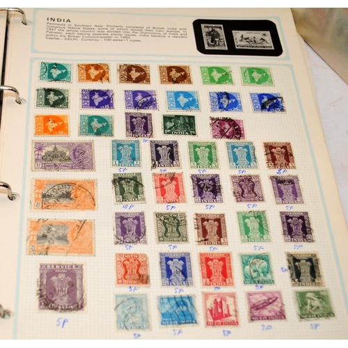 199 - A vintage Stanley Gibbons Worldex stamp album containing a schoolboy collection of stamps together w... 