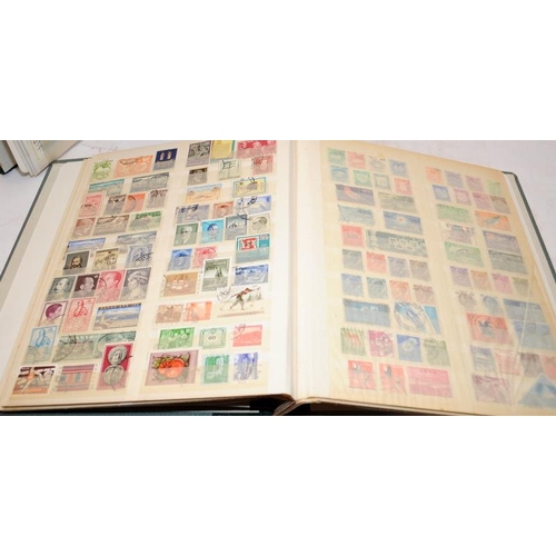 199 - A vintage Stanley Gibbons Worldex stamp album containing a schoolboy collection of stamps together w... 