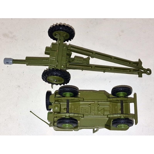 79 - Dinky toys U.S Jeep with 105mm Howitzer box not great shells missing