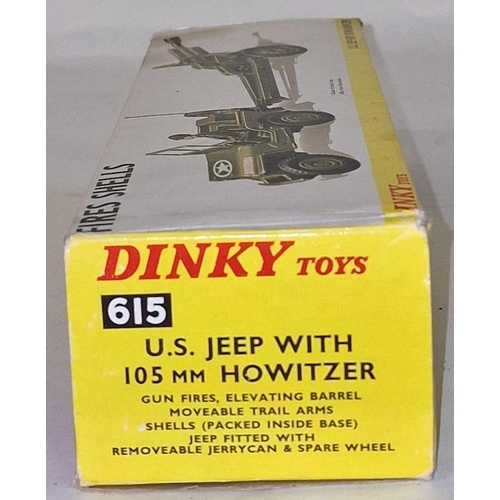 79 - Dinky toys U.S Jeep with 105mm Howitzer box not great shells missing