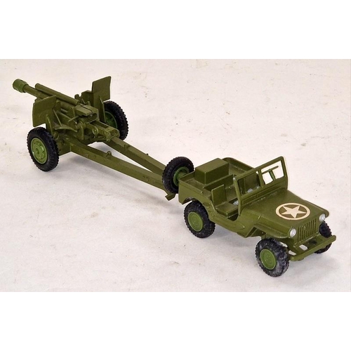 81 - Dinky model 615 U S Jeep with Howitzer box tatty not checked