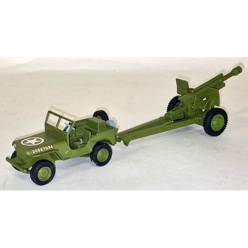 83 - Dinky model 615 U S Jeep with Howitzer box tatty not checked