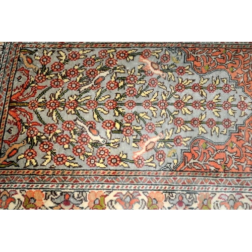 427 - Antique Turkish Kayseri rug sample presented framed under glass. O/all frame size 85.5cms x 57cms