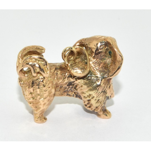 262 - 9ct Gold Charm in the form of a Dog. 7g