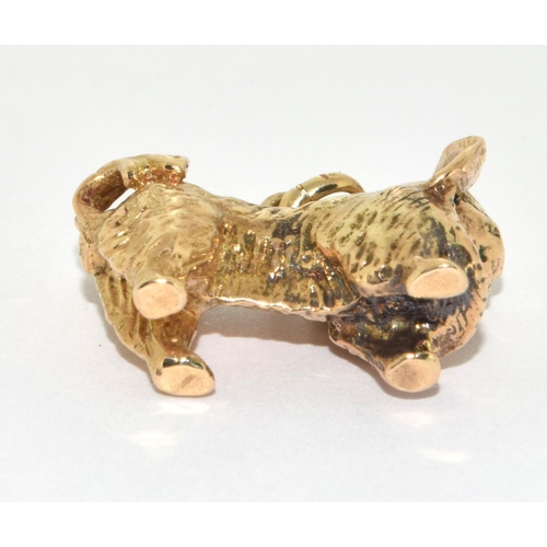 262 - 9ct Gold Charm in the form of a Dog. 7g