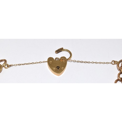 317 - 9ct Gold Bracelet with Heart Clasp & Safety Chain., all links individually hall marked, 14.5g