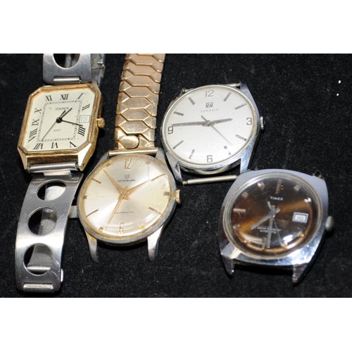 318 - A collection of vintage gents watch heads and other clock/watch related items. All offered for spare... 