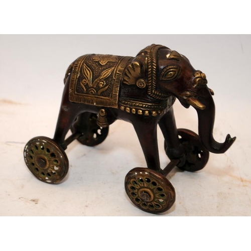 42 - A collection of vintage elephants, wood, soapstone, brass etc