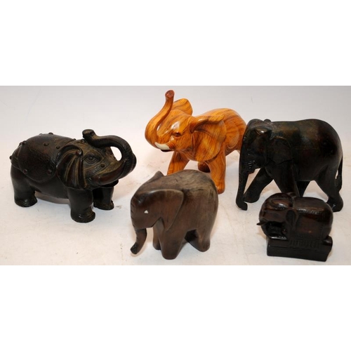 42 - A collection of vintage elephants, wood, soapstone, brass etc