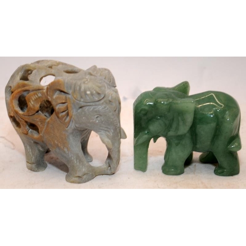 42 - A collection of vintage elephants, wood, soapstone, brass etc