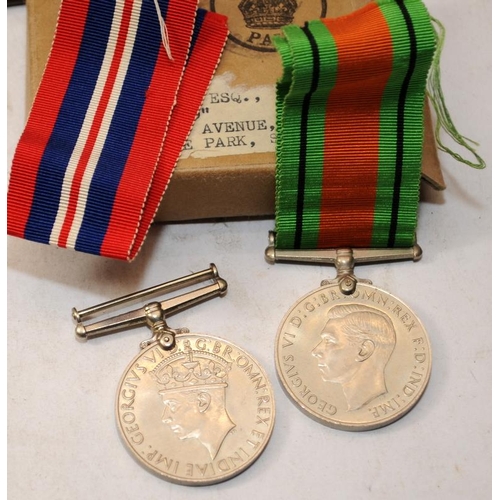 130 - Collection of curios to include WW2 medals, various badges and other military related ephemera