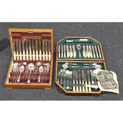 414 - Two vintage wooden cutlery canteens containing complete sets of silver plated flatware.