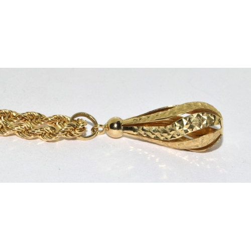 264 - 9ct gold rope chain necklace with an open work pendant 4g