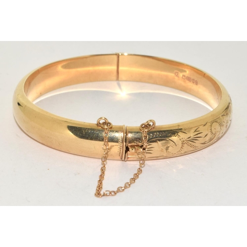 334 - 9ct gold ladies embossed bangle 11g