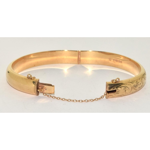 334 - 9ct gold ladies embossed bangle 11g