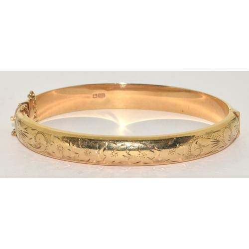 334 - 9ct gold ladies embossed bangle 11g