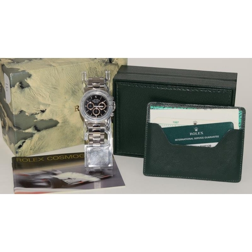 260 - 1997 Rolex Stainless steel Daytona with black dial, Model no. 16520, Box and Papers. Benefits from h... 