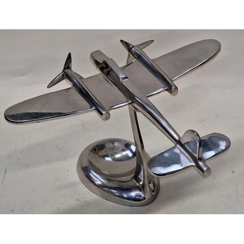 15 - Contemporary chrome ash tray in the form of a vintage air plane 22cm tall.