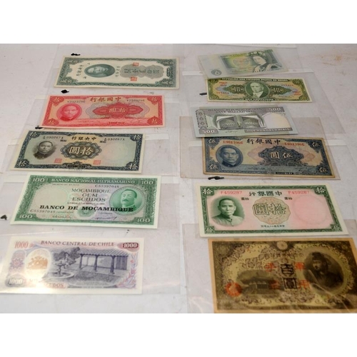 131 - Collection of world banknotes and coins. Many in uncirculated condition