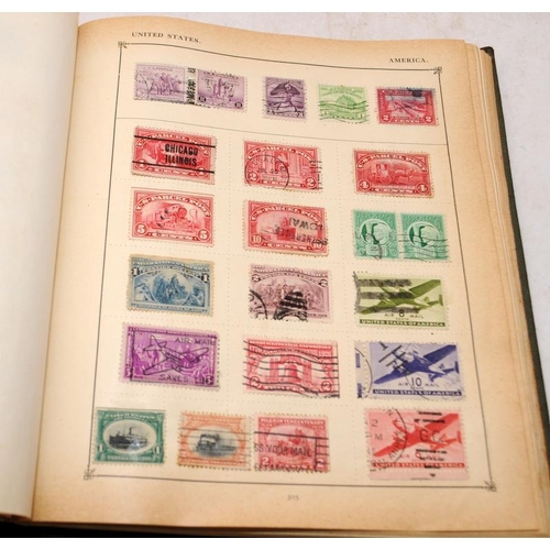 216 - Vintage 'The Strand' stamp album with a good selection of early world stamps. Worth looking through