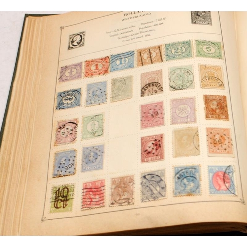 216 - Vintage 'The Strand' stamp album with a good selection of early world stamps. Worth looking through