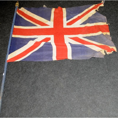 139 - Vintage distressed Union Flag on a wooden staff. 110cms x 83cms