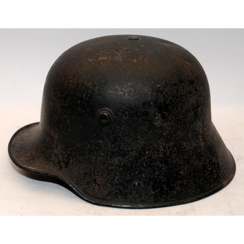 145 - German WW1 ET64 M1916 Steel helmet. In very good order with some original paint, liner and chin stra... 