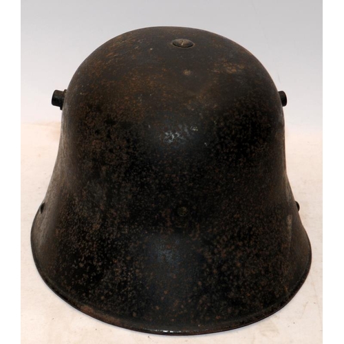 145 - German WW1 ET64 M1916 Steel helmet. In very good order with some original paint, liner and chin stra... 