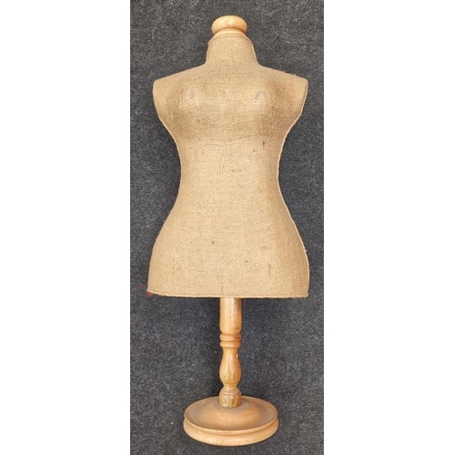 239 - A vintage dressmakers dummy on wooden stand.