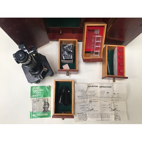 251 - Print scientific microscope. This is model number 1200 plz and comes in original box with drawers co... 