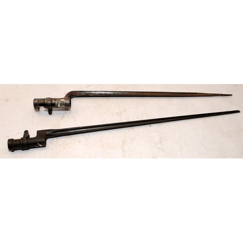 167 - Two antique military socket spike bayonets. Largest is 50.5cms long. One bears a serial number and a... 