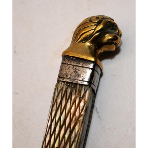 176 - Vintage unmarked ceremonial dagger with Mother of Pearl handle and gilt lions head finial