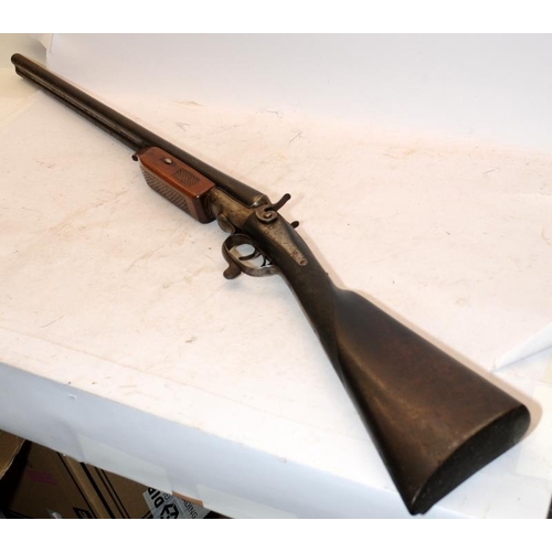 174 - Replica antique double barrel two trigger shotgun with working cocking and trigger mechanism. This f... 