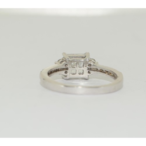 187 - Silver solitaire ring with stone set shoulders Size N