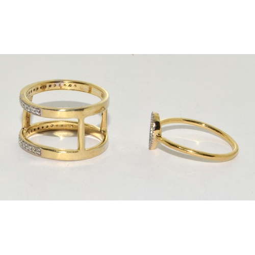 175 - Two modernist CZ gold on 925 silver rings size P 1/2 and R 1/2.