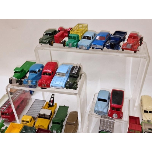 305 - Large group of vintage play worn die cast vehicles to include many examples by Dinky and Corgi (50).